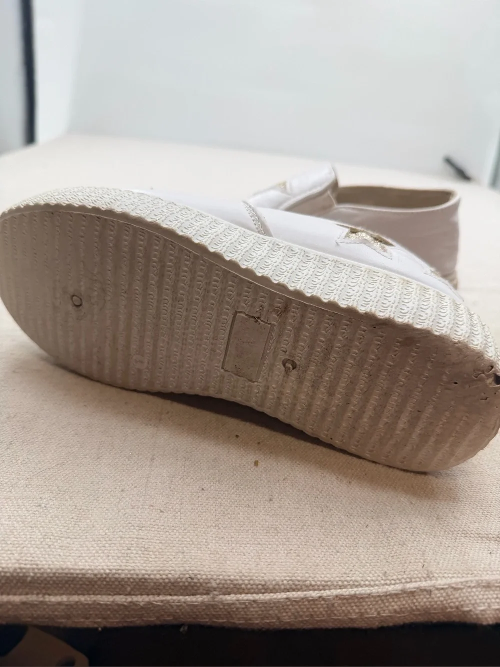 ' White Slip-On Sneakers with Gold Star Accents